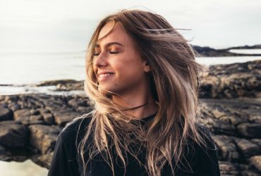 girl in sunshine on beach