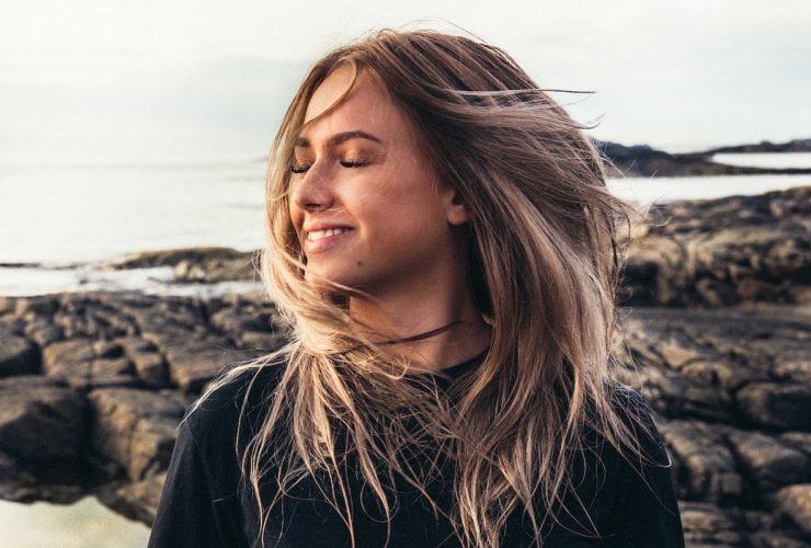 girl in sunshine on beach