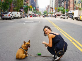 woman and her dog in the city