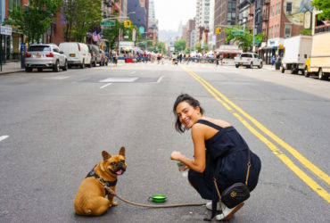 woman and her dog in the city