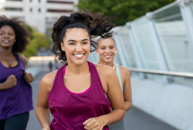 happy women jogging
