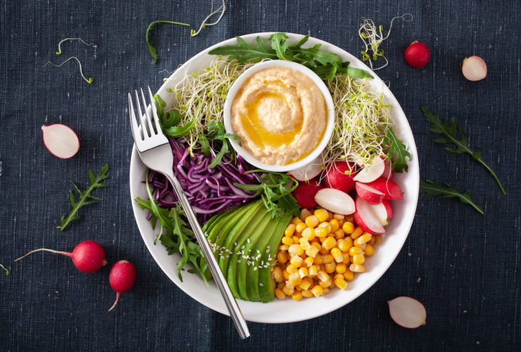 plate of vegetables with hummus