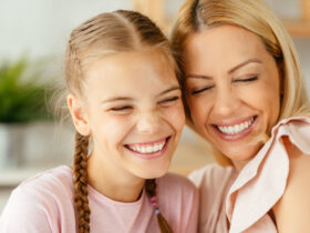 mother and daughter smiling
