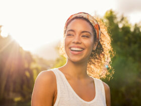 girl smiling in sunshine