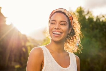 girl smiling in sunshine
