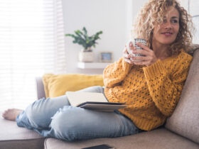 happy woman drinking tea connected to intuition