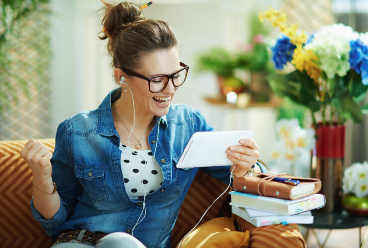 Happy female health coach sharing over social media