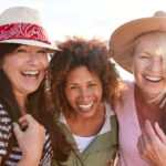 Three women in their 40s friends hiking together
